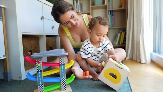Mother and son playing with educational toys