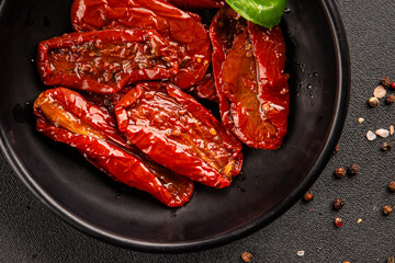 Sun-dried tomatoes snack vegetables natural product tasty snack fresh delicious gourmet food background on the table rustic top view copy space keto and paleo diet vegan and vegan food