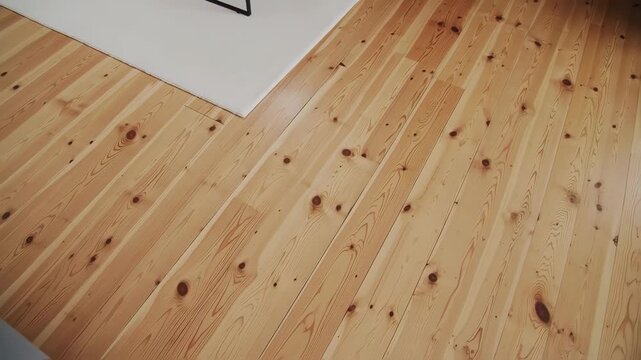 Light beige wooden planks form a floor