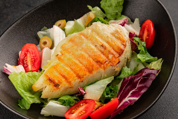 Grilled chicken breast salad chicken breast tomato, green leaf lettuce, salad mix snack vegetable tasty snack fresh gourmet food background on the table rustic top view copy space keto and paleo diet