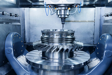 Producing precision turbine wheel part with five axis arm CNC machine © Parilov