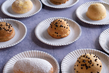 Modern bakery with many ingredients such as wheat flour, sugar, eggs, grains, fruit, butter, milk.