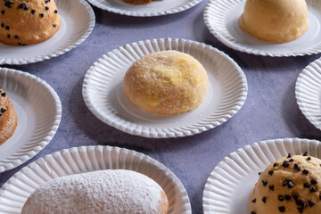 Modern bakery with many ingredients such as wheat flour, sugar, eggs, grains, fruit, butter, milk.