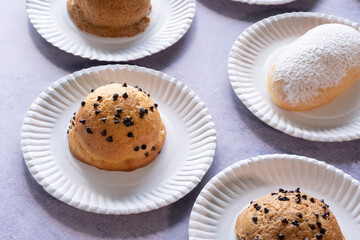 Modern bakery with many ingredients such as wheat flour, sugar, eggs, grains, fruit, butter, milk.