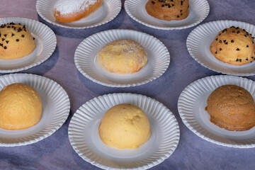 Modern bakery with many ingredients such as wheat flour, sugar, eggs, grains, fruit, butter, milk.