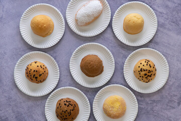 Modern bakery with many ingredients such as wheat flour, sugar, eggs, grains, fruit, butter, milk.