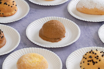 Modern bakery with many ingredients such as wheat flour, sugar, eggs, grains, fruit, butter, milk.