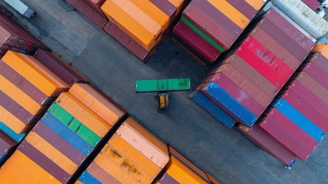 Fototapeta Aerial view global business logistic transportation container cargo international terminal port, Container cargo industrial import export port by container cargo ship, Sea freight shipping container.
