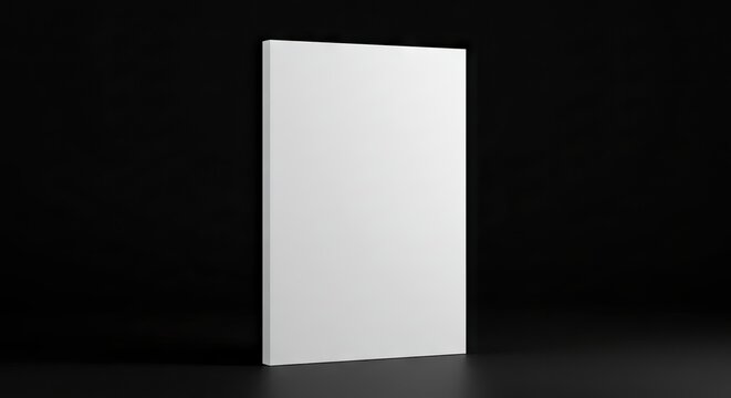 A white rectangular panel stands against a black backdrop