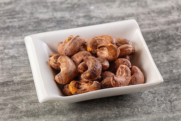 Unpeeled cashew nuts in the bowl