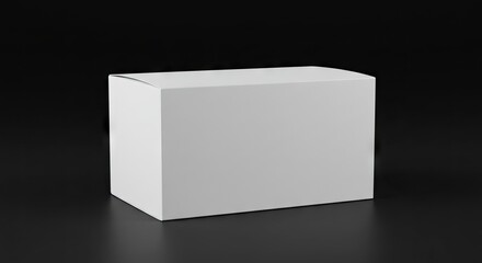 A plain white rectangular cardboard box sits on a glossy black surface against a black backdrop