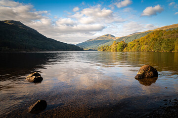 A sunny, autumnal HDR image of Loch Eck looking north from the shore of Jubilee point picnic site, Argyll and Bute, Scotland