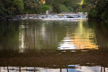 A pastoral, autumn HDR image of the River Massan flowing through Glen Massan on its way to Holy Loch, Argyll and Bute, Scotland.