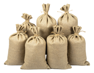 Group of tightly knotted burlap sacks with twine closures against a transparent backdrop