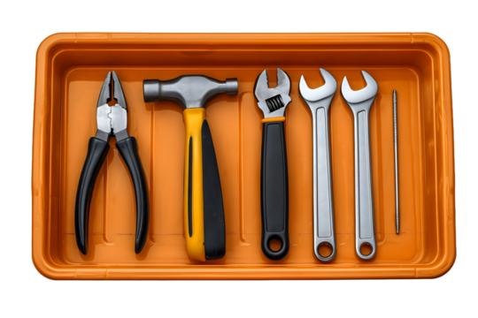 Essential hand tools collection with hammer pliers wrenches and screwdrivers in orange plastic tool tray isolated on white background cutout.