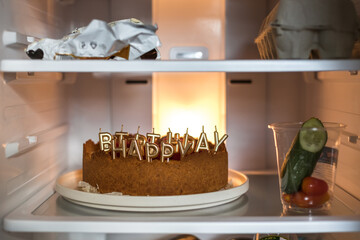 cheesecake birthday cake with raspberries in fridge with candles Happy Birthady