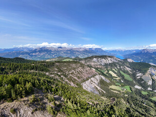 Naklejka premium Panoramic view of Lac Serre-Poncon lake surrounded by mountains and valleys, Hautes-Alpes, France, Europe.