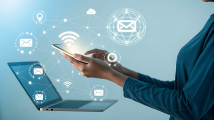 Businesswoman using a smartphone with network connection interface on screen, cloud computing, big data, internet of things, digital marketing concept