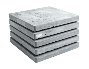 Stacked, square, gray stone tiles on a black background, showing textured surfaces and edges