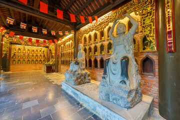 Buddha statues along the corridor lead to Bai Dinh pagoda, one of the largest in the south east Asia in Ninh Binh, Vietnam