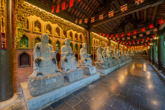 Buddha statues along the corridor lead to Bai Dinh pagoda, one of the largest in the south east Asia in Ninh Binh, Vietnam