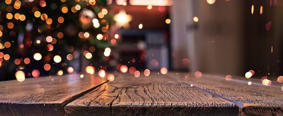 Wooden Background with Blur Effect. Christmas Tree and Garland Lights. Home holiday background