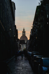 Evening city street with dome silhouette at sunset © Roiz Photography