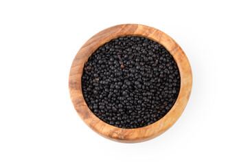 Dried black lentil on the white background