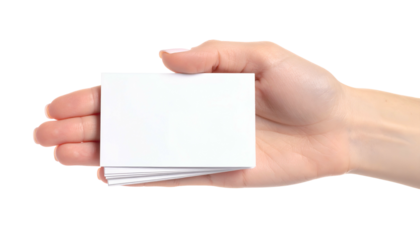 Hand presenting a stack of blank rectangular cards with a clean white surface