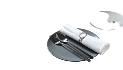 Close up of a gray plate with silverware and neatly rolled white napkin