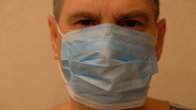 A person wearing a medical mask at a doctor's appointment