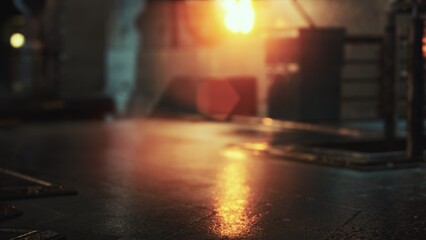 Warm light glows as molten material pours in an industrial setting. Reflections shimmer on the surface, showcasing the activity of skilled workers focused on their craft.