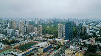Cloudy winter morning drone photography over the upscale San Isidro district in Peru.