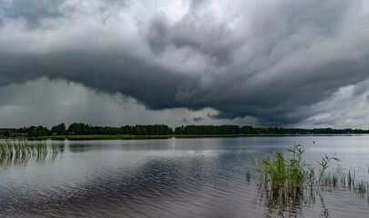 Varska Bay with mineral water and healing mud with rain clouds on the border with Pskov. Varska town. Estonia