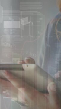Animation of graphs and trading board, caucasian businesswoman surfing on digital tablet in office