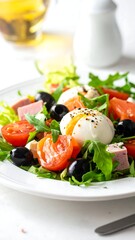 A close-up image shows a plate with fresh salad and poached eggs
