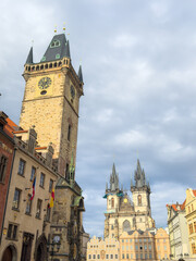 Prague Astronomical Clock and Old Town Square with St. Nicholas Church and Týn Church — iconic European landmark and popular travel destination.