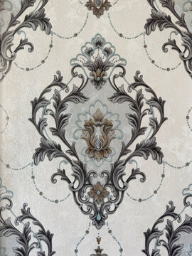 Close up of classic floral and ornamental texture in random swirls pattern. Baroque European classic graphic background, suitable for wallpaper. Seamless background texture.