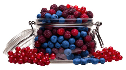 A clear glass jar brimming with a colorful assortment of berries, including blueberries, raspberries, and redcurrants, displayed attractively.