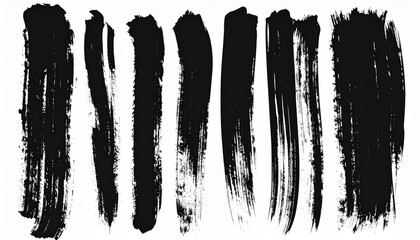Collection of realistic black paint brush strokes and smudges on a white background, evoking a sense of artistic expression and creativity