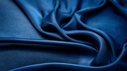 Fototapeta premium Luxurious Flowing Blue Silk Fabric Texture Background
