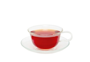 Glass cup of hot aromatic tea on white background
