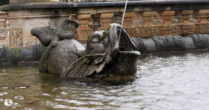Dresden Germany historic Zwinger palace fountain 4K. Industrial center of East Germany, now unified German, European Union (EU) and NATO. Total destruction in WW II. Palace rebuilt historically.