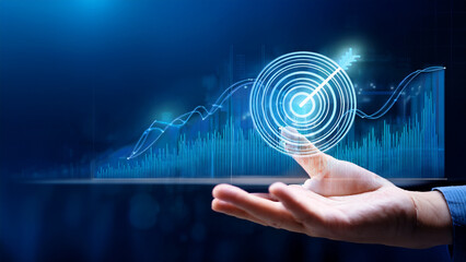 Technology and Business Growth Concept with Hand and Digital Target