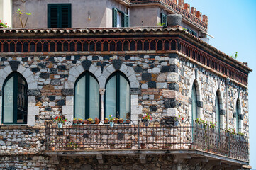 Obraz premium windows in a grunge brick wall in Sicily Italy