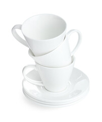 Stack of ceramic cups and saucers isolated on white