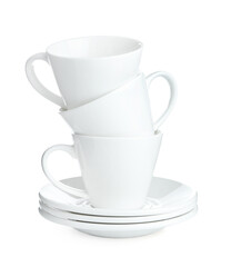Stack of ceramic cups and saucers isolated on white