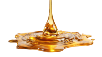 Golden liquid pouring, creating ripples