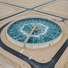Aerial View of Circular Wastewater Treatment Plant in Desert Landscape