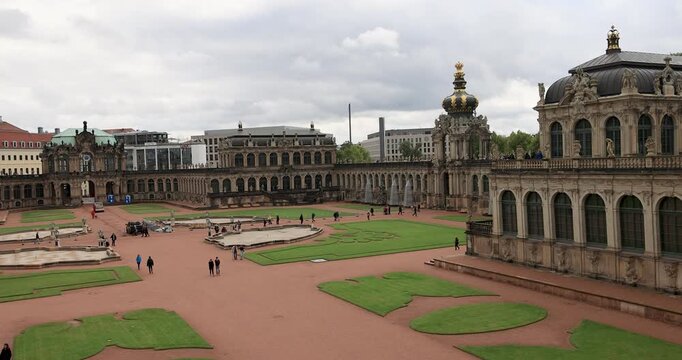 Dresden Germany old historic Zwinger palace garden 4K. Industrial center of East Germany, now unified German, European Union (EU) and NATO. Total destruction in WW II. Palace rebuilt historically.